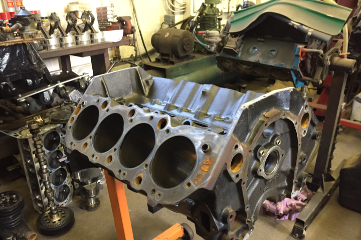 A partially rebuilt car engine is shown at Kenny’s Garage Auto Repair Shop in Erie, PA.